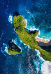 Kelingking beach, Nusa Penida, Indonesia. Aerial view at sea and rocks. Blue water background from...