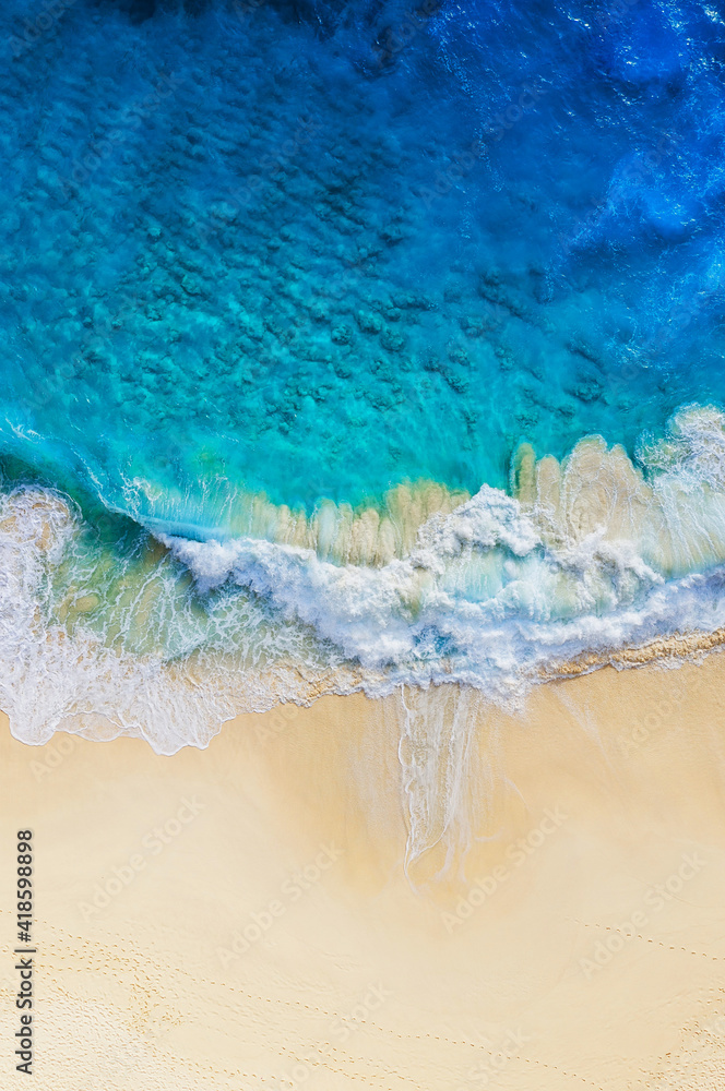 Wall mural travel and vacation image. coast as a background from top view. blue water background from air. summ
