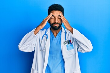 Handsome hispanic man with beard wearing doctor uniform and stethoscope with hand on head, headache...
