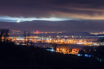 Fototapeta na wymiar Klodzko, night panorama of the city against the background of mountains.