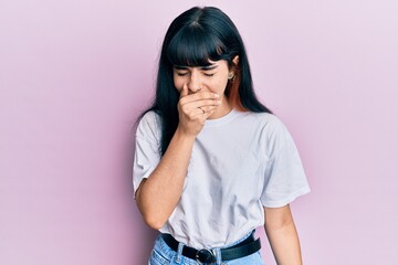 Young hispanic girl wearing casual clothes feeling unwell and coughing as symptom for cold or bronchitis. health care concept.