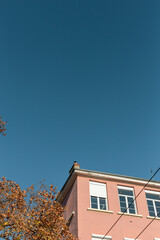 facade of a building in neutral pink colours in Lyon