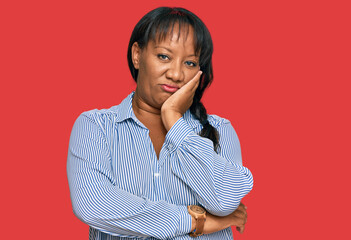 Hispanic middle age woman wearing casual clothes thinking looking tired and bored with depression...
