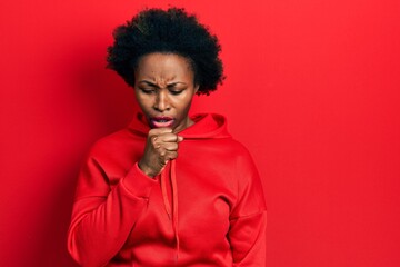 Fototapeta na wymiar Young african american woman wearing casual sweatshirt feeling unwell and coughing as symptom for cold or bronchitis. health care concept.