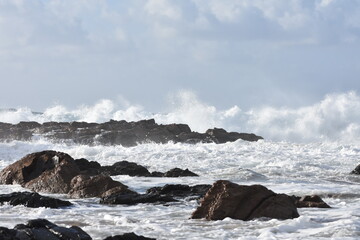 The sea demonstrating its power against the cliffs