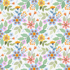 Colorful hand draw flowers seamless pattern on light green background for fabric, textile, and wallpaper.