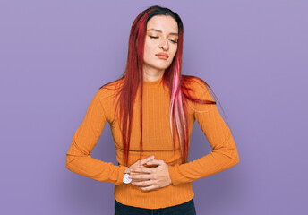Young caucasian woman wearing casual clothes with hand on stomach because indigestion, painful...