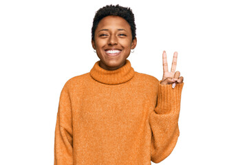Young african american woman wearing casual clothes smiling with happy face winking at the camera...
