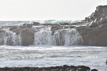 The sea demonstrating its power against the cliffs