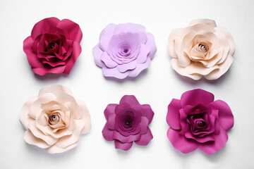 Different beautiful flowers made of paper on white background, top view
