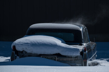 Old car in the snow.  Silverton, Colorado.