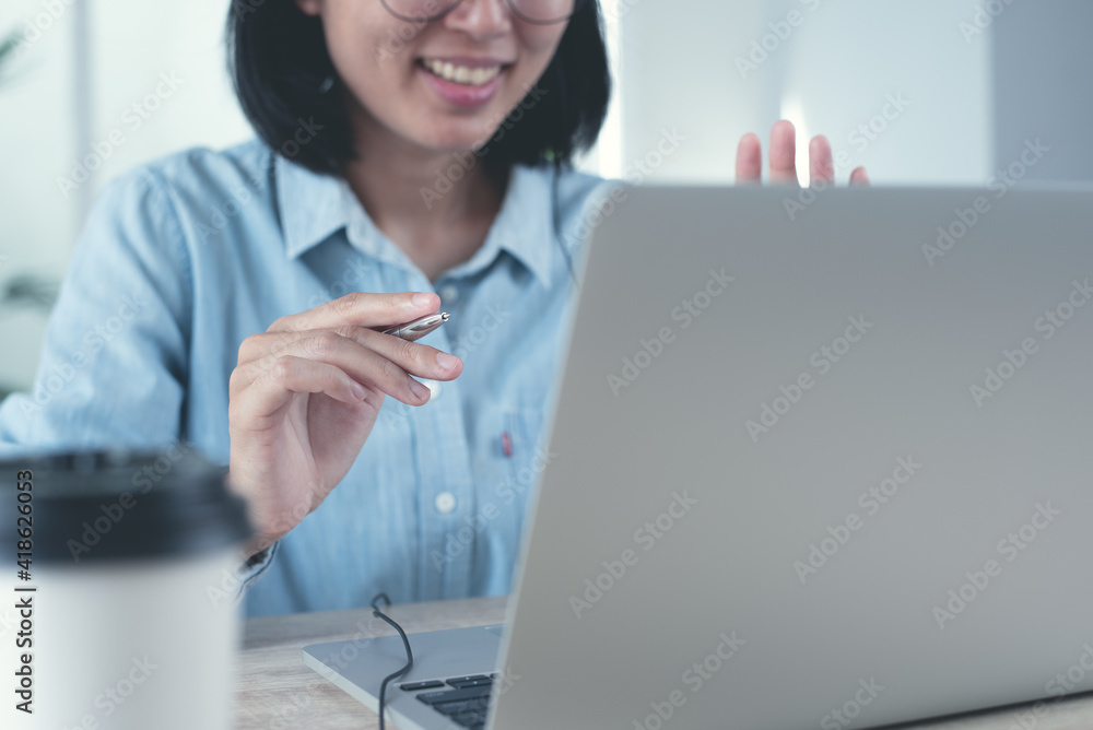 Canvas Prints business woman making facetime video conference via laptop computer using zoom online meeting app in