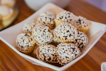 Homemade candies with white granulated chocolate, called 