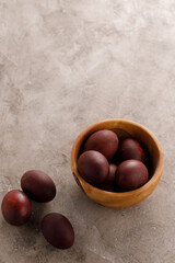 Still life many colorful easter eggs on a textural background. Rustic. Easter celebration concept.