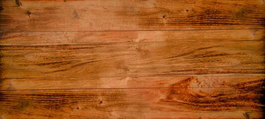Naklejka premium Brown rustic high-resolution wood texture background surface with old natural pattern. Abstract background of super long walnut wooden plank table. panorama wood bark timber background with copy space