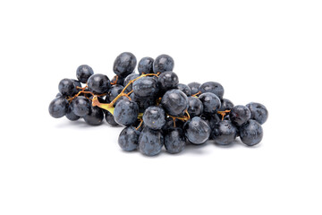 Bunch of organic black grapes isolated on white background