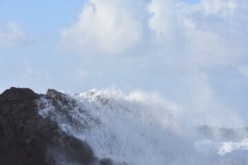 The sea demonstrating its power against the cliffs