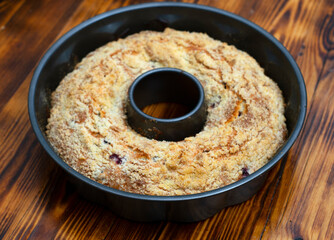 Homemade cupcakes on the oven baking dish in a special form. hot fresh cupcake from the oven