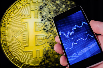 Bitcoin and cryptocurrency investing concept. Mobile phone application to trade Bitcoin BTC in...