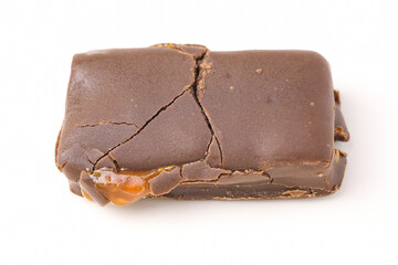 Chocolate bar with caramel isolated on a white background.