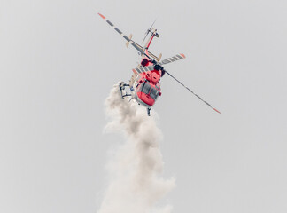 Indian Air Force Sarang helicopter air display team flying HAL Dhruv aircraft.