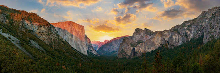 Yosemite valley nation park during sunset view from tunnel view on twilight time. Yosemite nation park, California, USA. Panoramic image.