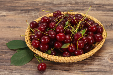 Sweet ripe cherry with leaves