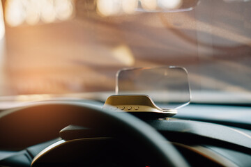 Car head up display on the sunset