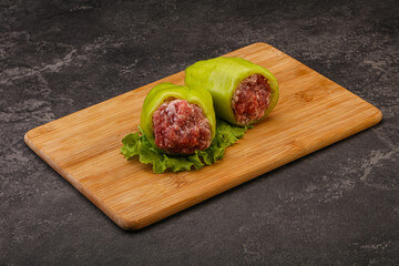 Raw stuffed pepper for cooking