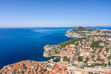Fototapeta na wymiar Aerial drone shot of west Dubrovnik with view of Fort Lovrijenac and Lapad peninsula in Croatia summer