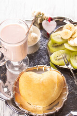 Fruity oghurt smoothie,bun and fresh fruit for breakfast