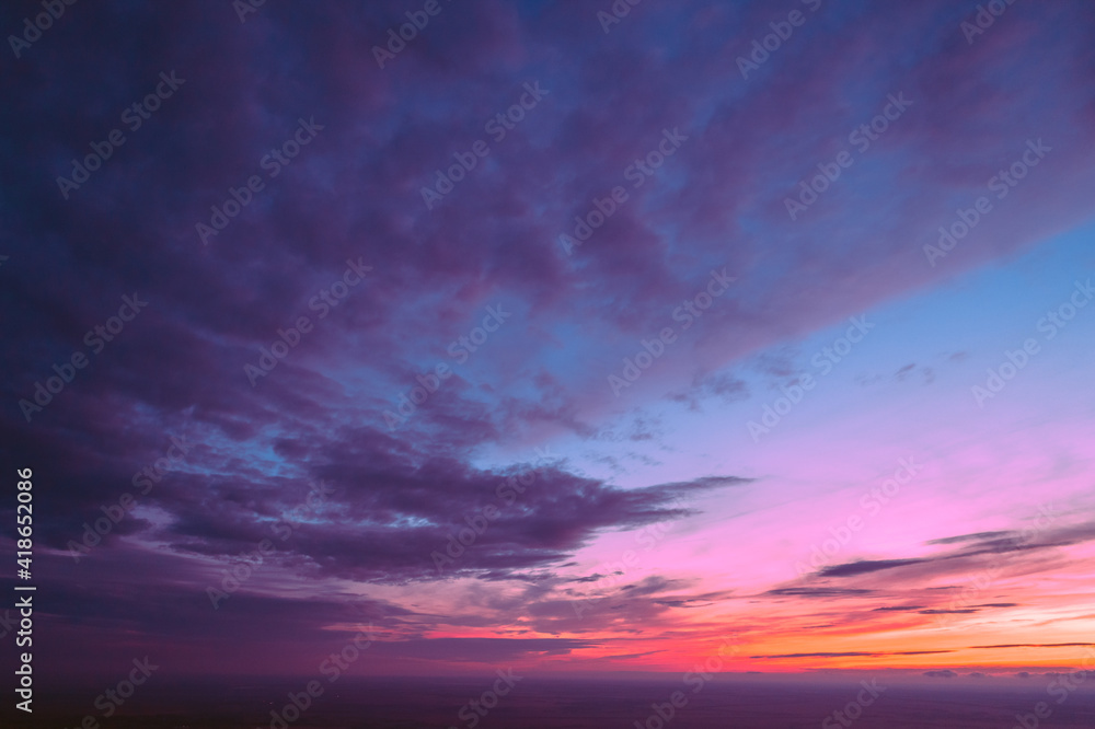 Wall mural colorful cloudy sky at sunset. gradient color. sky texture. abstract nature background