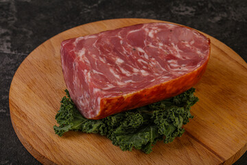 Beef ham piece over board