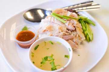 Close-up chicken rice on a white table