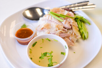 Close-up chicken rice on a white table