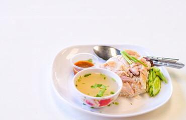 Close-up chicken rice on a white table