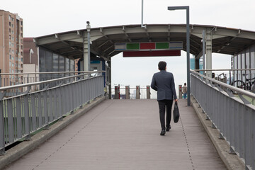 people walking on the bridge