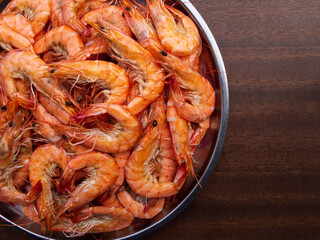 The above picture of shrimp or prawn That was made by steaming or boiling or baking, was placed in...
