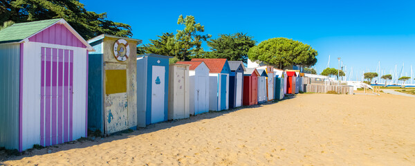 Wooden beach cabins on the Oleron island in France, colorful huts  © Pascale Gueret