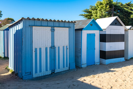 Wooden beach cabins on the Oleron island in France, colorful huts
