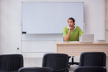 Young male student in business presentation concept