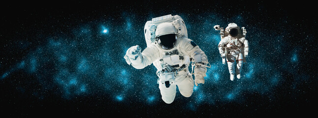 Astronaut spaceman do spacewalk while working for space station in outer space . Astronaut wear...