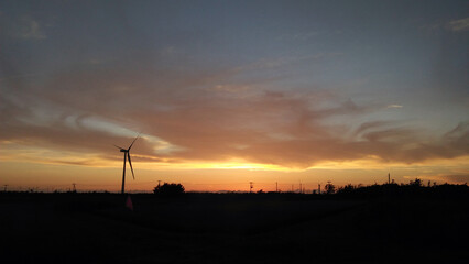 Fototapeta na wymiar Windmill in sunset