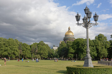 Citizens have a rest in the Alexander Garden in St. Petersburg