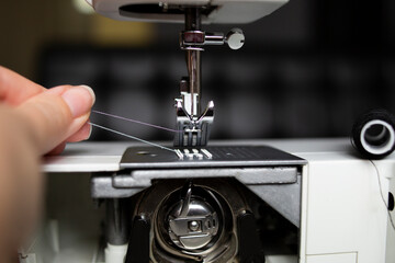 Replacing the Spool of Thread on the Sewing Machine