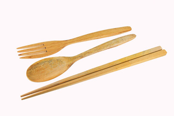 Wooden chopstick, spoons & forks isolated on white background