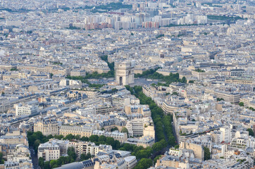 Fototapeta na wymiar Aerial View from Paris, France. With its cinemas, cafes, luxury specialty stores and horse chestnut trees, Avenue des Champs-Élysées is one of the most famous streets in the world ad Sene River