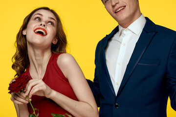 Cheerful man and woman date communication luxury roses fun