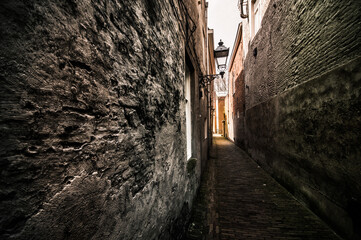alley with old textured walls