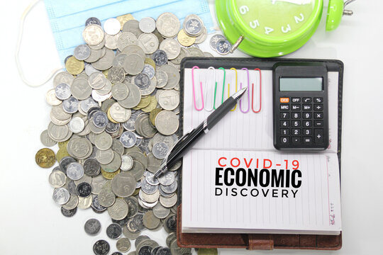 notebooks, pens, bell clocks, face masks and coins with Covid-19 Economic Discovery inscriptions.